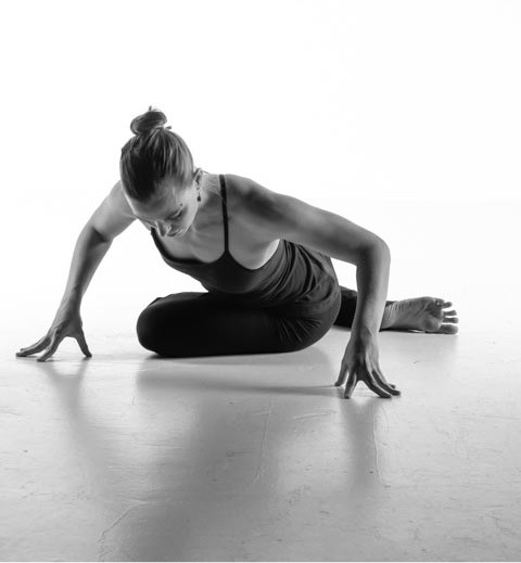 Emily Seymour yoga pose seated twist immunity boosting tips
